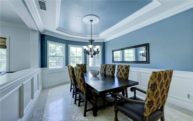 Note the coffered ceiling in the formal dining room.