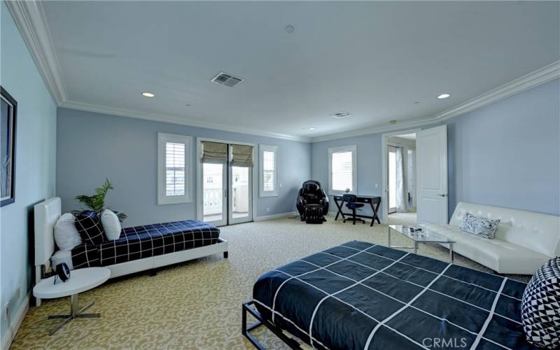 So much space in this bonus room with crown molding and large baseboards too!