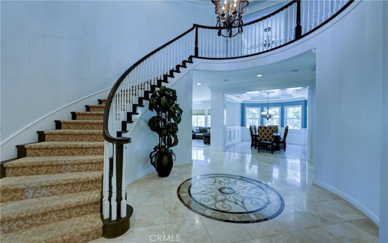 Beautiful curved staircase in the grand foyer.