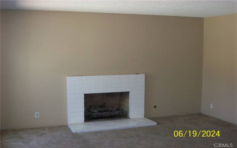 View Of Fireplace In Living Room