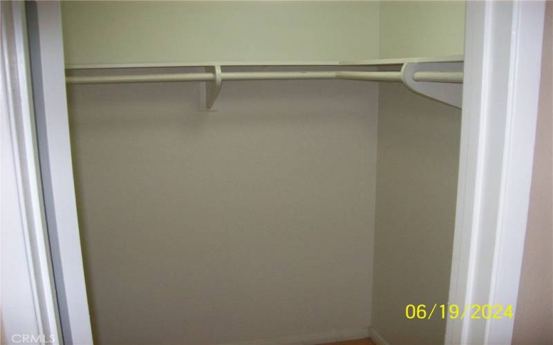 View Of Walk-In Closet In Primary Bedroom Suite