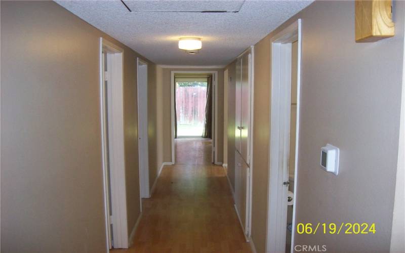 Hallway View Looking Towards Primary Bedroom Suite