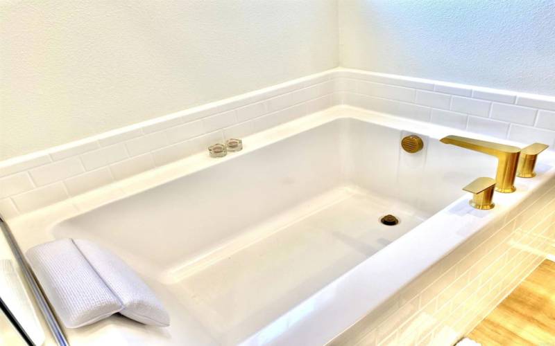 Yes!  A separate soaking tub to relax and enjoy your new home in!