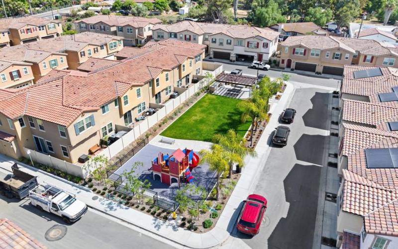 Overhead of Common Area Park and Barbecue area.  Also a toddlers play gym area.  Guest Parking also!