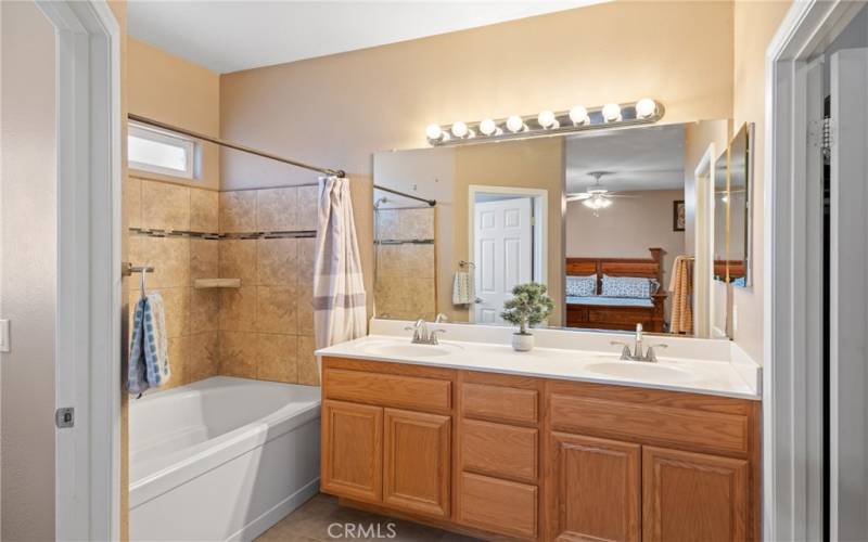 Primary Bathroom with double sinks & large soaking tub/shower combo