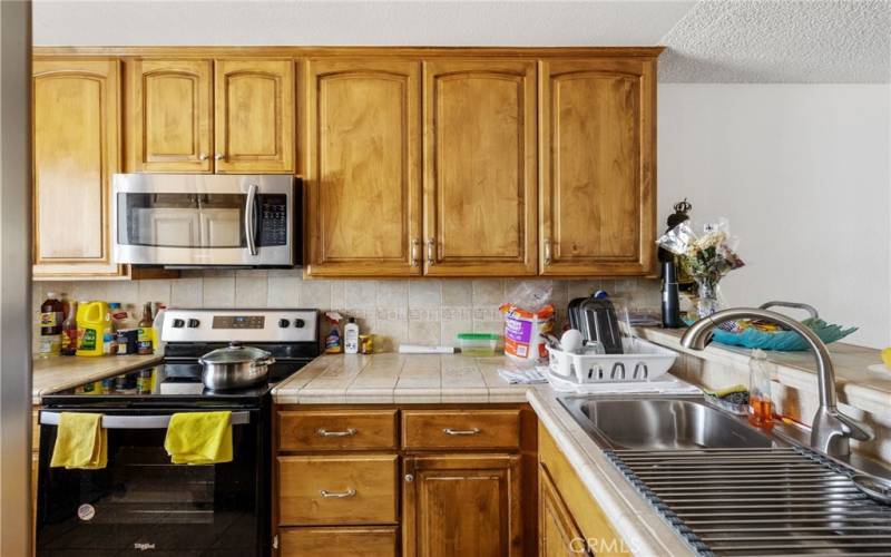 Kitchen cabinets and stainless steel appliances