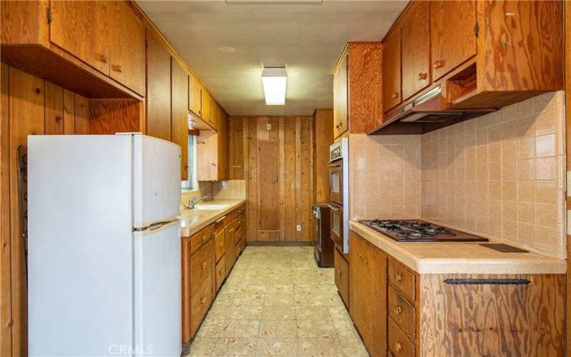 Galley kitchen is ample sized.