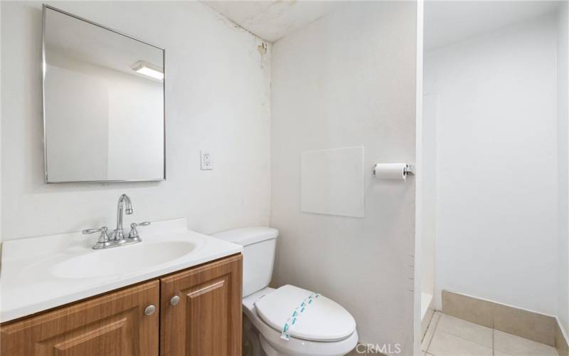 This 3/4 bathroom is just off of the 4th bedroom at 3723 East 5th Street