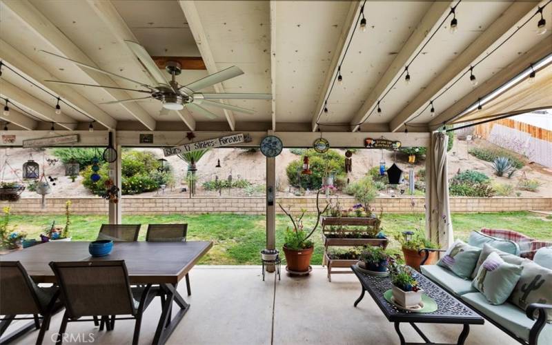 Covered Patio with lighted ceiling fan really keeps the house cool