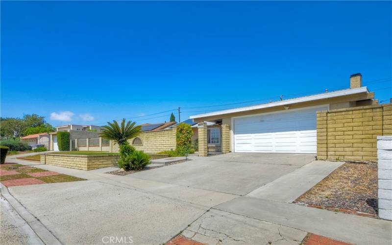 Gated front yard & low maintenance astro style turf lawn in front of fenced area, step into a very private front patio offering a shaded area in the afternoon