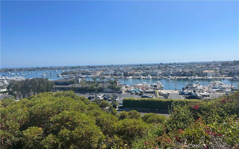 Panoramic views of the Newport Harbor's entrance, bay, Catalina and the ocean beyond.