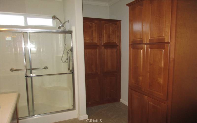 Primary Bathroom Linen Cabinets