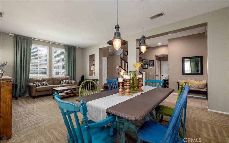 Dining room with pendant lighting.