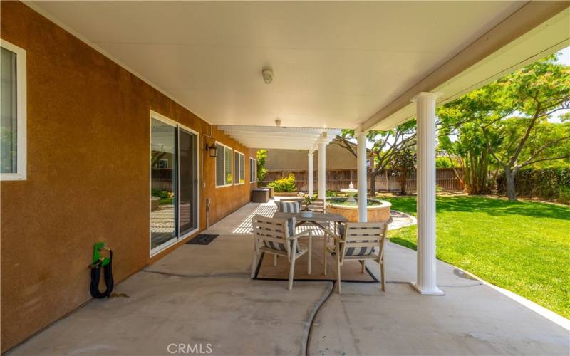 Patio with cover and seating area.