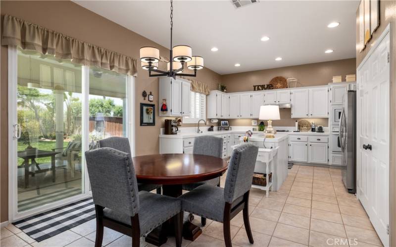 Eating area with slider to the backyard.