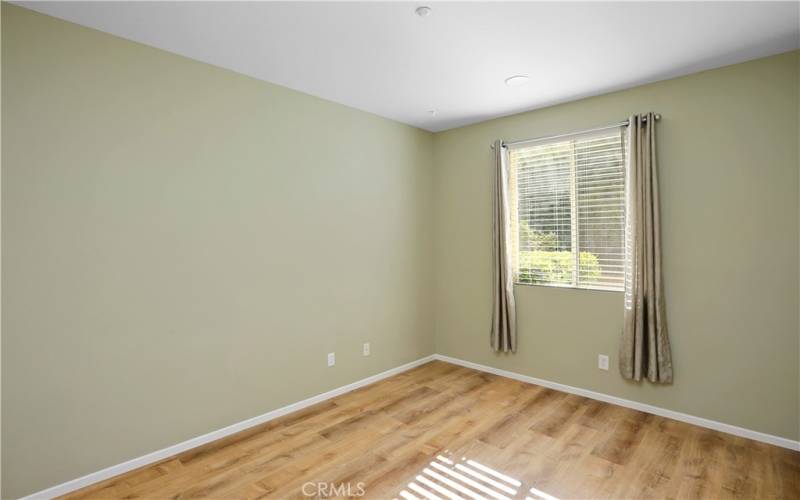 Downstairs bedroom (walls newly painted white)