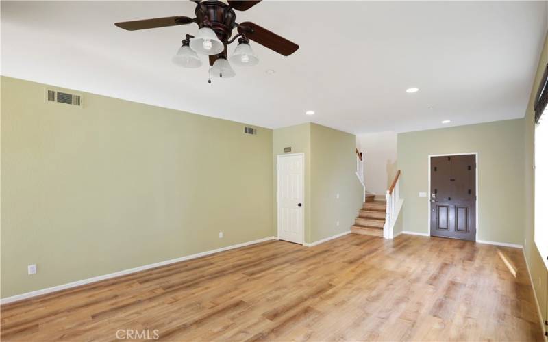 Entrance leading to living area (walls newly painted white)