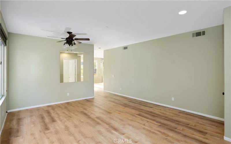 Living area (walls newly painted white)