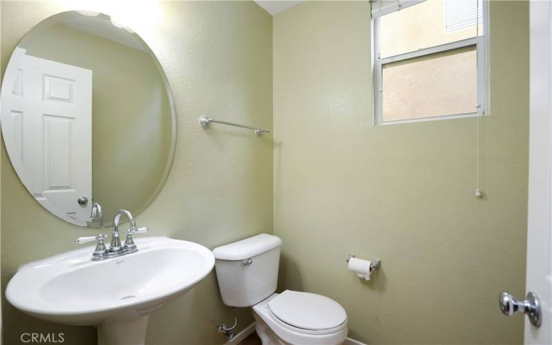 Downstairs powder room (walls newly painted white)