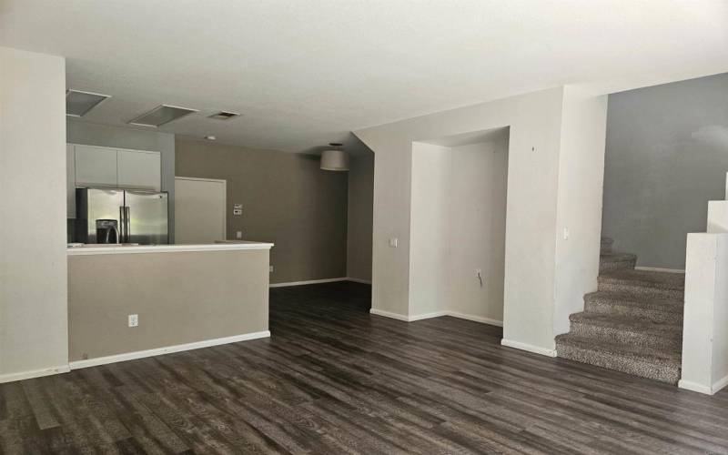 View from living room to kitchen and dining area