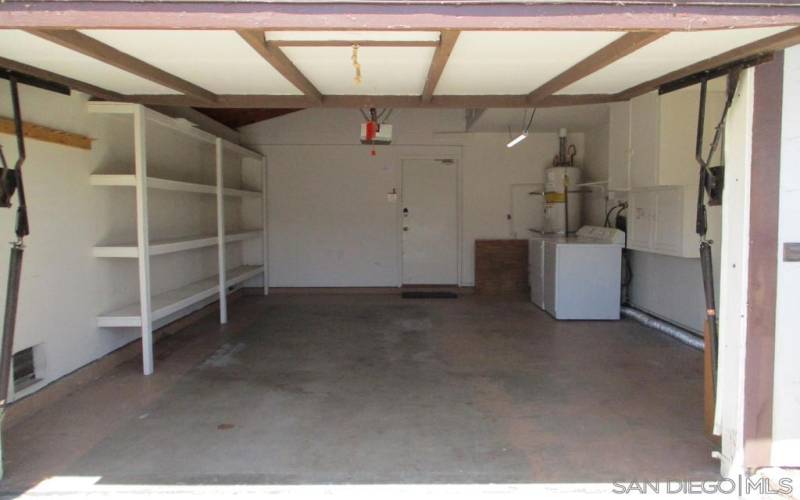 Lots of shelving and a surprising amount of room in the attached garage!