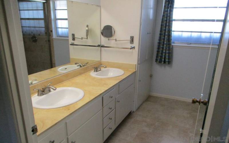 Double sinks and tile flooring