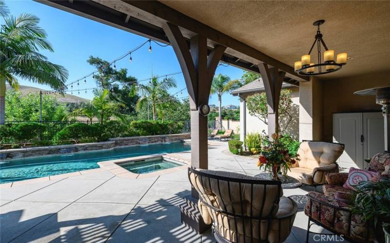 Shaded patio in backyard.