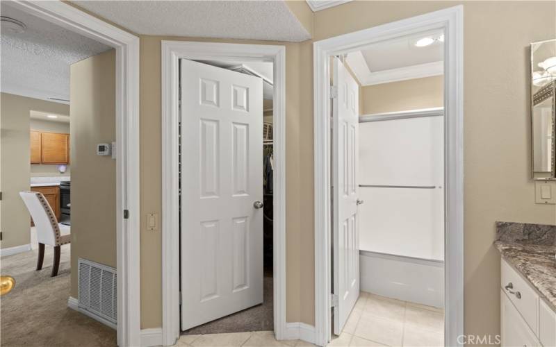 Door to the large walk in closet and water closet.