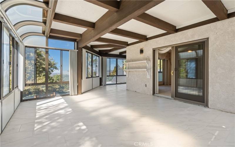 sunroom upstairs off primary bedroom