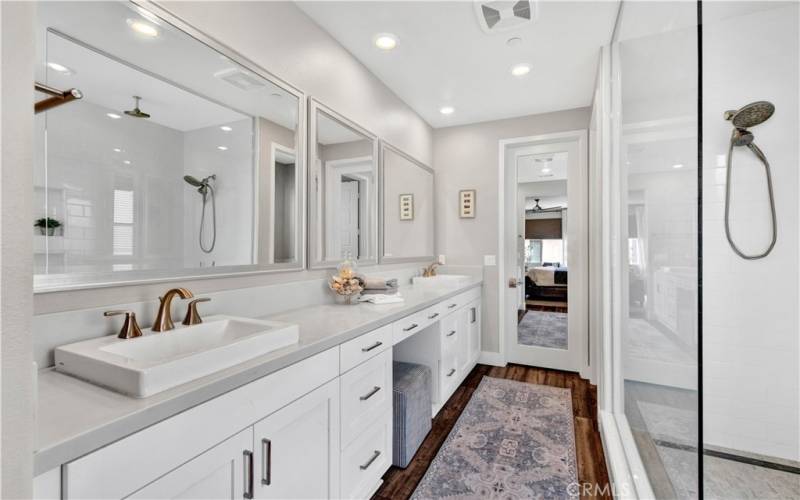Master bathroom with his-and-her sinks and a walk-in shower