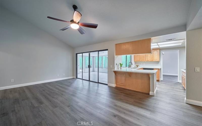 Bar seating area in gathering room open to kitchen