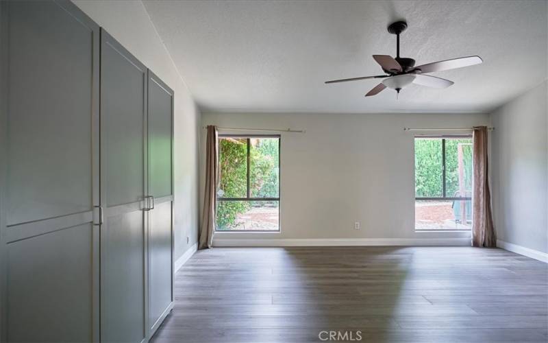 Primary bedroom suite.  Extra closet space that is moveable or removable. Floor to ceiling windows!