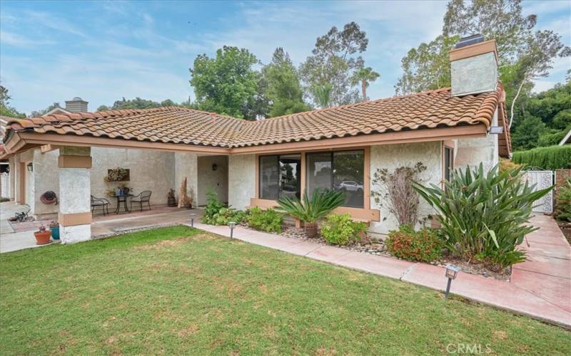 Beautiful front lawn and mature vegetation