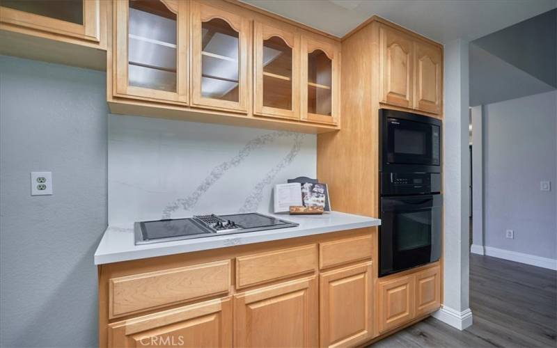 Double oven. Beautiful cabinets with some show off-glass