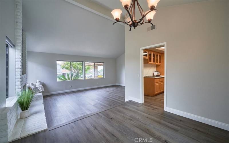 Raised dining room open to expansive living room