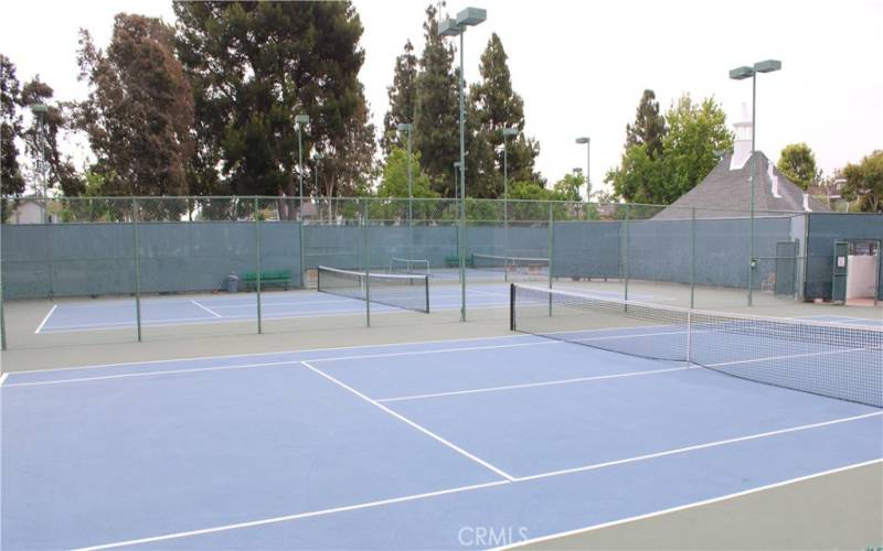 view of 3 tennis courts