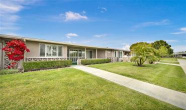 An emerald necklace surrounds this lovely unit accented by Rubellini palms trees.