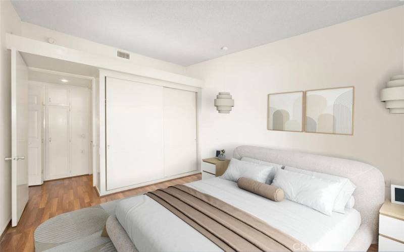 Spacious bedroom with spacious wall closet.  Virtual staging