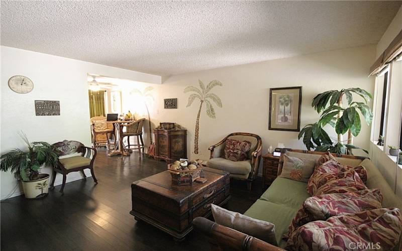 Beautiful open living room with newer bamboo flooring.