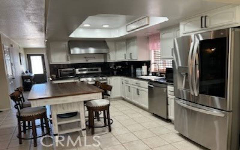 Kitchen with island dining set included