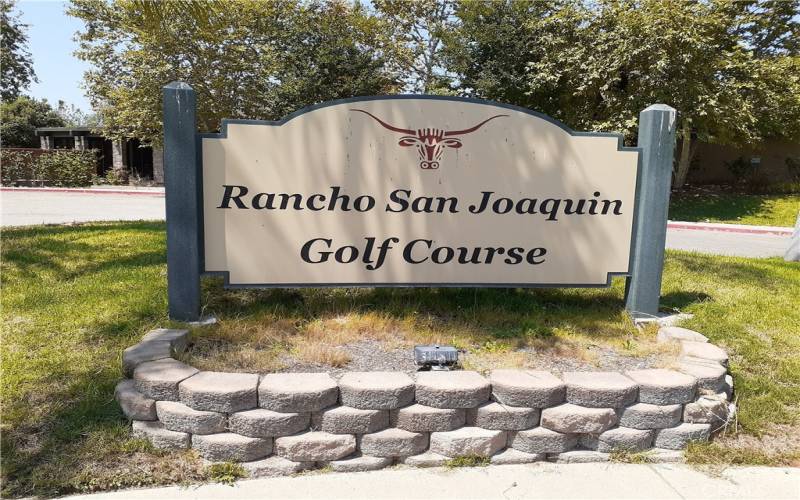 Around corner is entrance to Rancho San Joaquin Golf club with excellent restaurant The Terrace