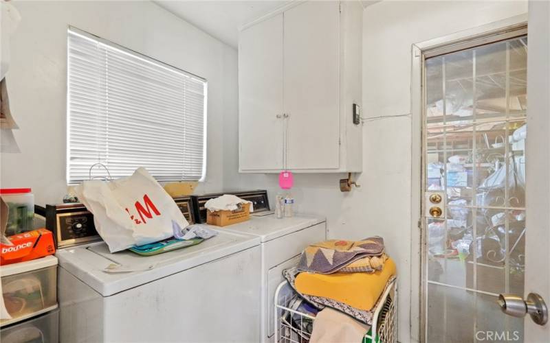 Laundry room is adjacent to the kitchen and has direct access to 2 car garage