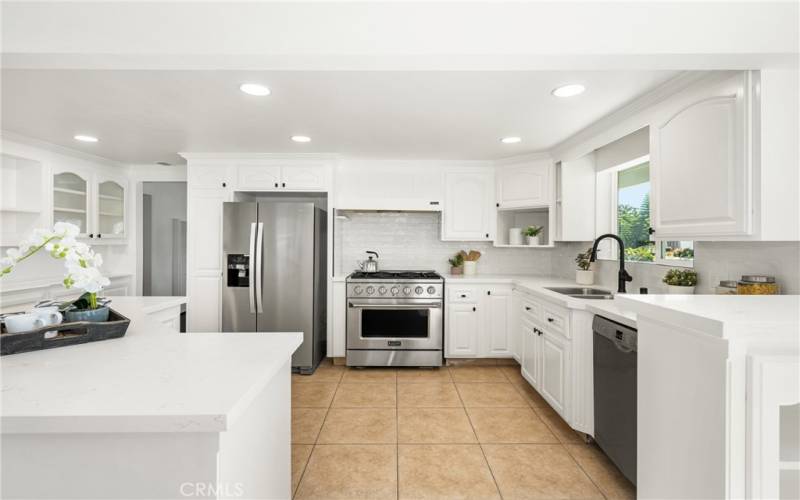 beautiful upgraded kitchen with new counter tops and kitchen window