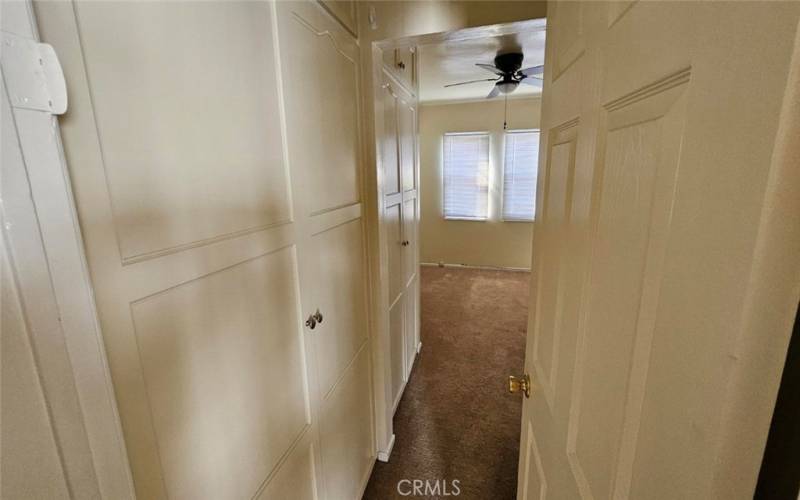 Bedroom with lots of closet storage.