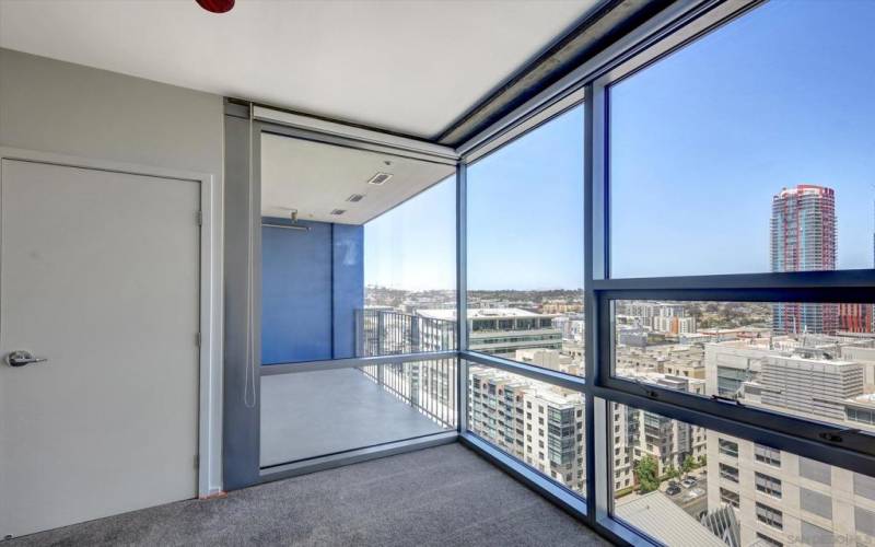 EXPANSIVE GLASS FROM THIS BEAUTIFUL BEDROOM ENVELOPES THE ENTIRE VIEWS OF THE CITY!