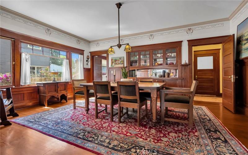 Dining room with glass front buffet.