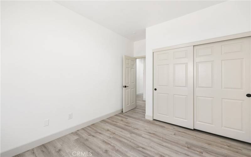 Guest Bedroom: Spacious Double Door Closets Throughout.