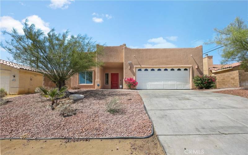 Beautiful Santa Fe Style Home with Desert Red Rock Landscaping...