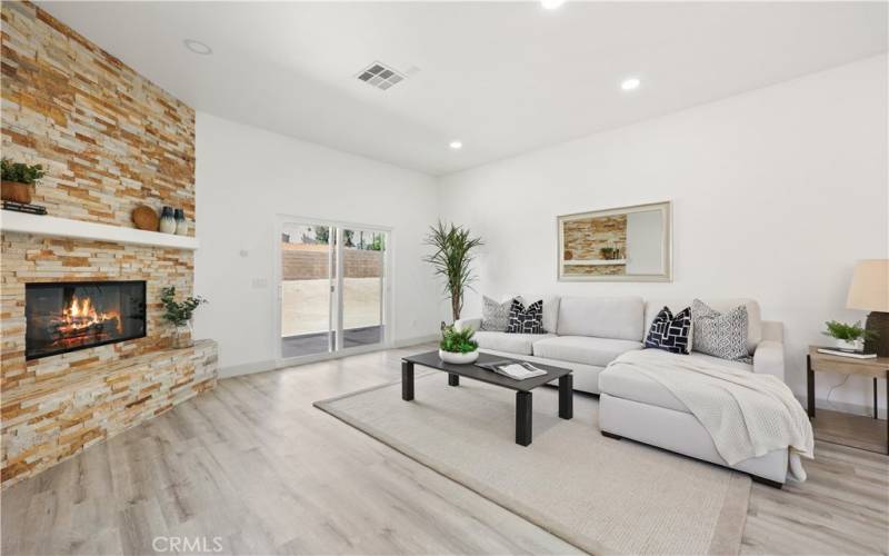 Living Room, Ledger Stone Fireplace & New Sliding Door.