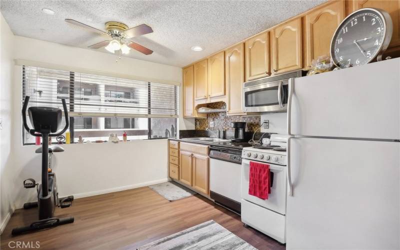 Kitchen overlooks the balcony